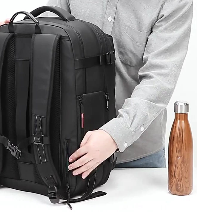 Back of the travel backpack showing shoulder straps and rear panel