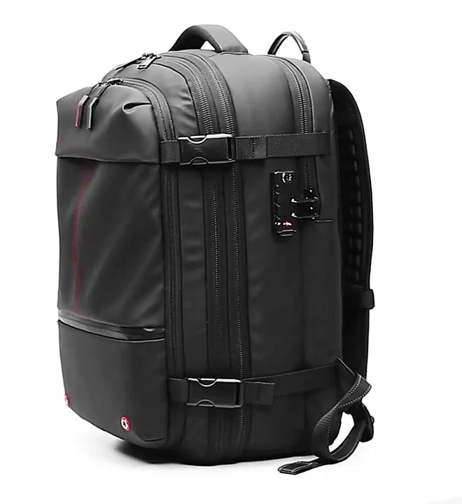 Black travel backpack showing its front pockets, side straps and combination lock